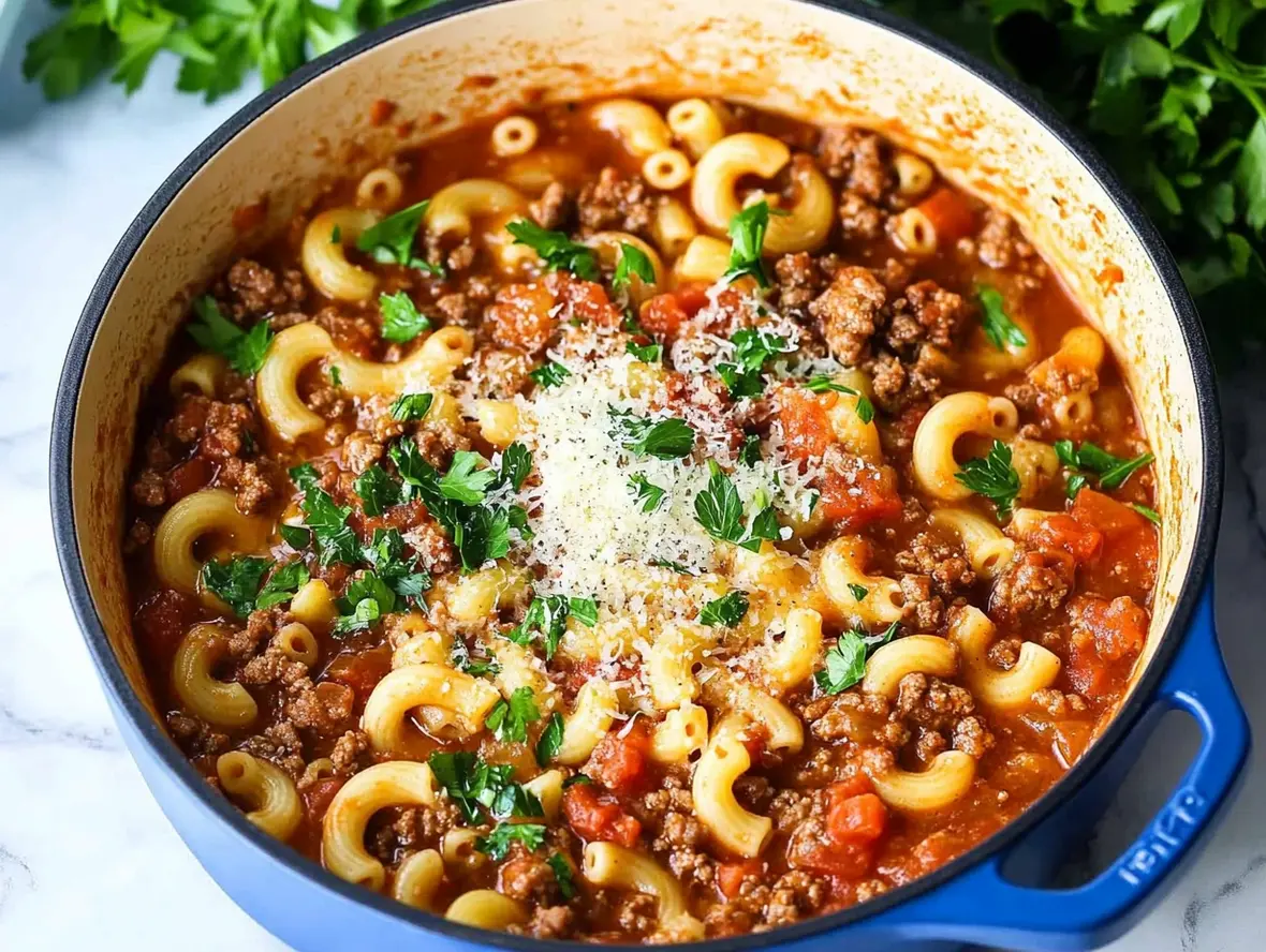 A person serving a bowl of hearty, affordable stew.