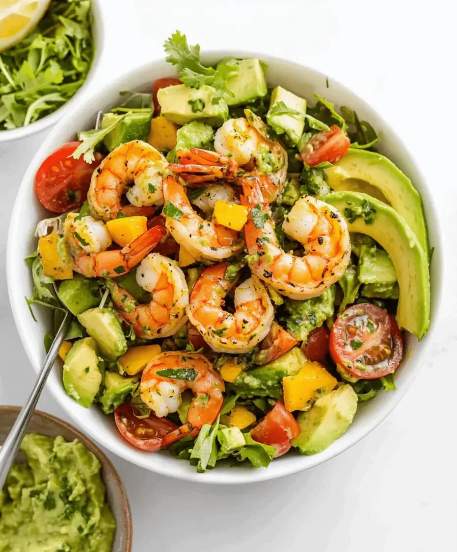 A close-up of Shrimp Avocado Salad garnishes, highlighting fresh cilantro and lime wedges.