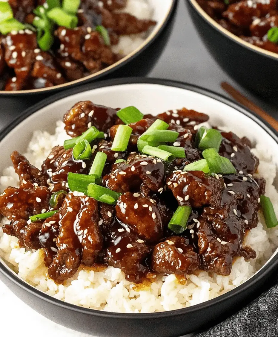 A close-up shot of the glossy beef teriyaki sauce coating tender beef slices, garnished with sesame seeds and green onions.