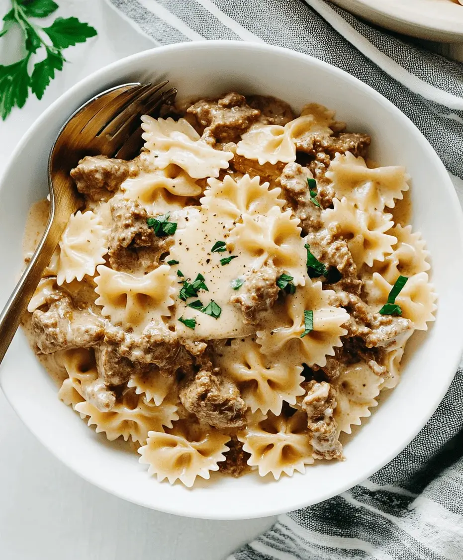 Close-up of Beef and Bowtie Pasta with Alfredo Sauce