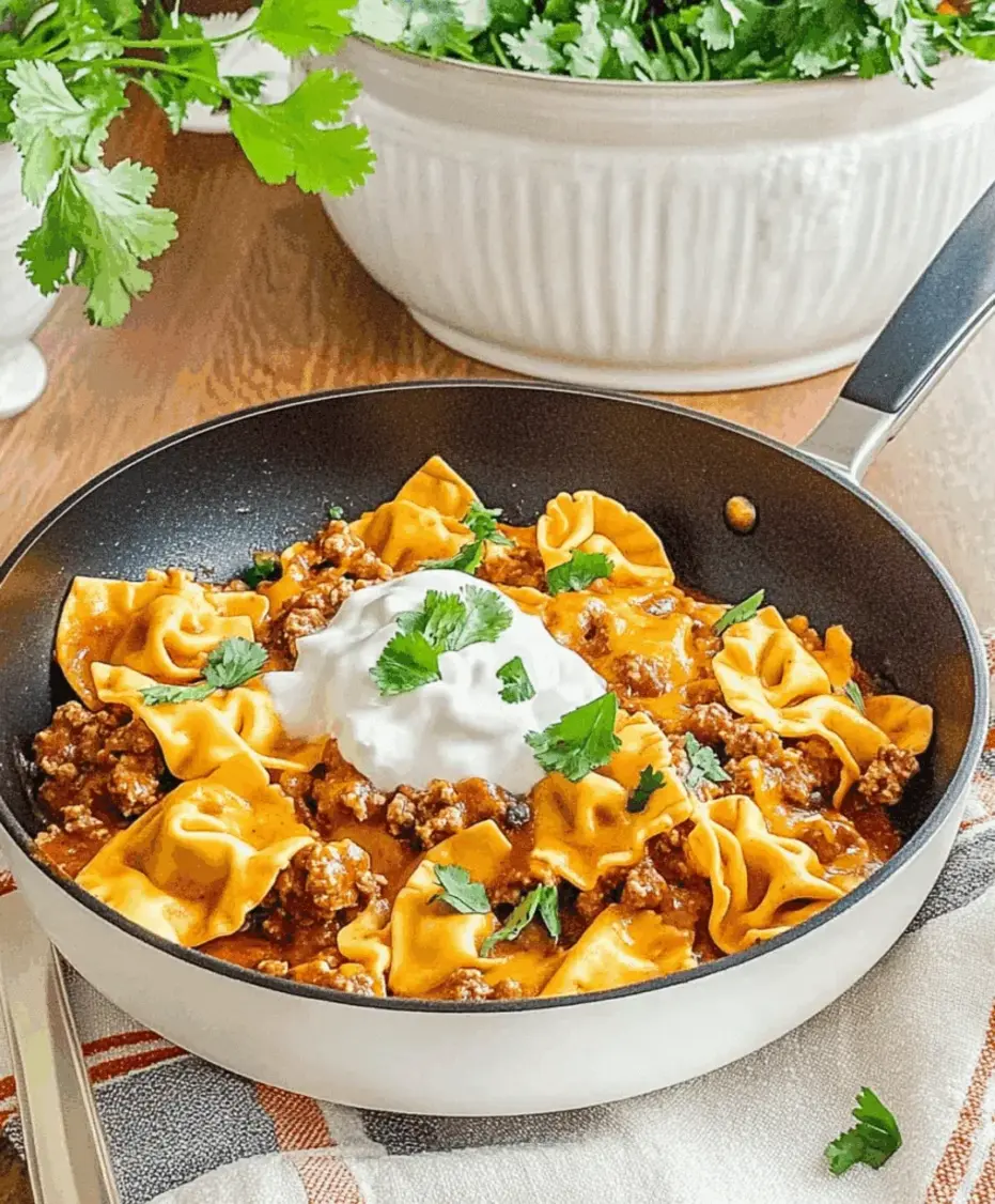 Cheesy Beef Enchilada Tortellini Skillet sizzling in a cast iron pan, showing melted cheese and colorful garnishes