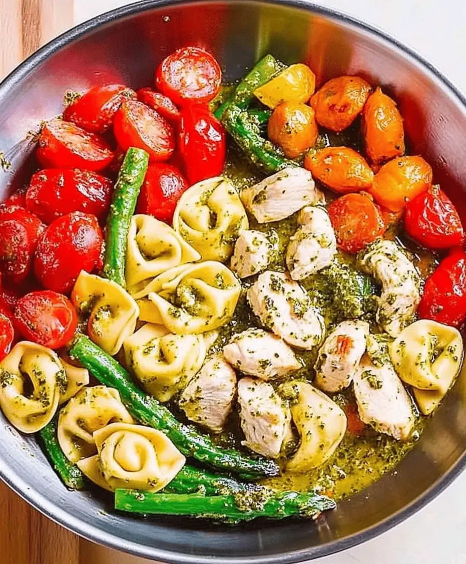 Finished plate of Pesto Chicken Tortellini and Veggies garnished with Parmesan and

</p>
</div>
</div></article>
			<div class=