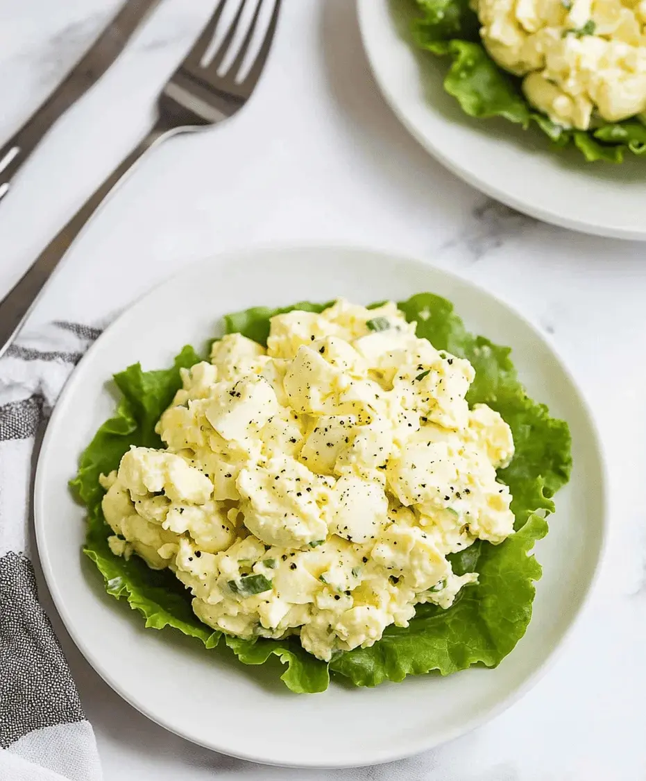 Serving Keto Egg Salad with lettuce wraps